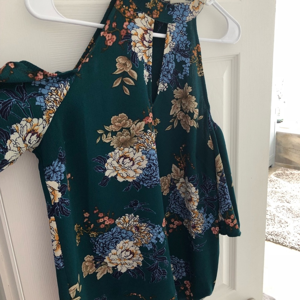 Cold shoulder blouse.